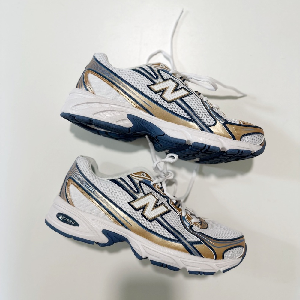 New Balance 740 from anthropologie women’s 9.5, men’s 8. Like-new